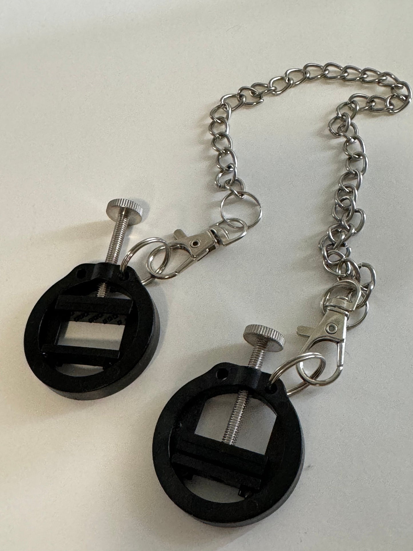 Adjustable Press Nipple Clamps With Chain